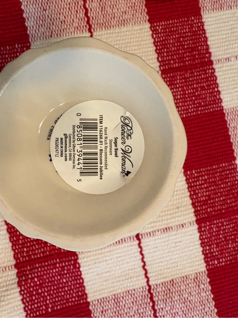 The Pioneer Woman “Spoonful of Sugar” sugar bowl.  Like new